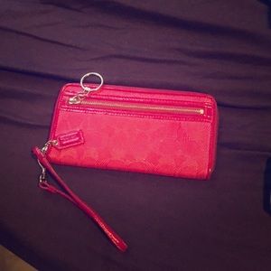 Pink coach wristlet/wallet